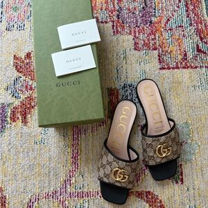 Gucci Women's Tan GG Logo Mules with Gold Accent